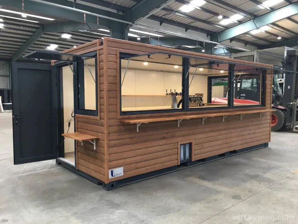 A 6-meter (20-foot) shipping container housing a cafe, with a very minimalist design photo 2
