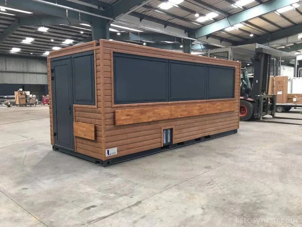 A 6-meter (20-foot) shipping container housing a cafe, with a very minimalist design photo 4